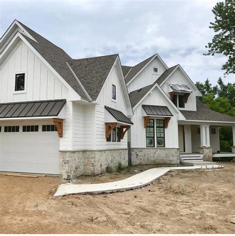 pictures ranch house partial stone exterior metal roof|stone houses with metal roof.